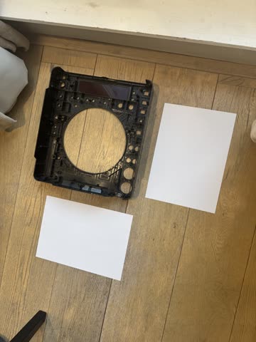 Before — angled photograph with a paper sheet as a known-size reference