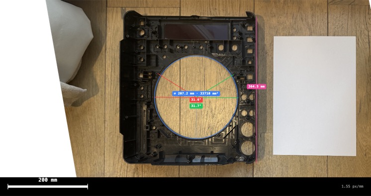 Measured — the corrected image with measurement annotations baked in